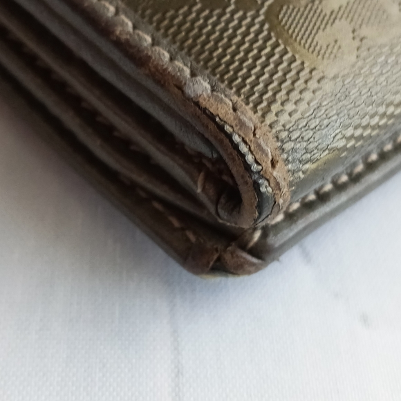 Authentic Gucci Metallic brown Signature wallet with GG charm - Picture 5 of 16